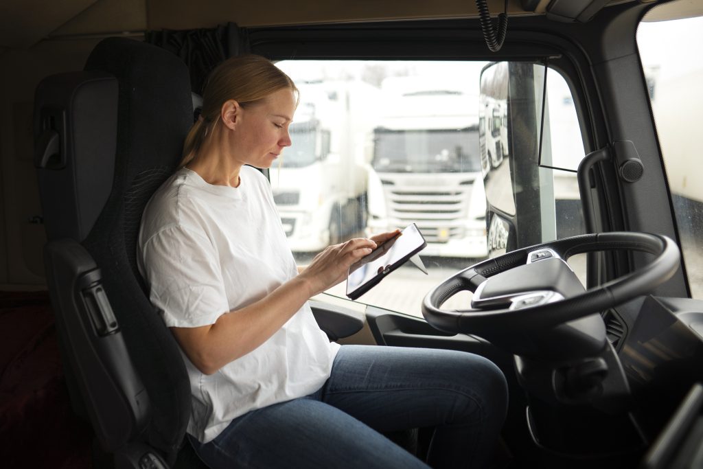 Business Owner filling out a quote in her commercial truck.